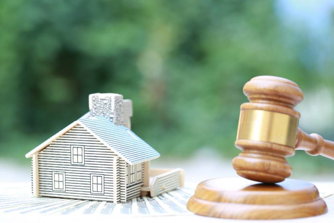 Property,Auction,,Model,House,And,Gavel,Wooden,On,Natural,Green